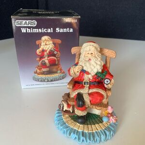 Vintage Sears Whimsical Santa Resin Figurine 5” Sitting On Chair With Toys.